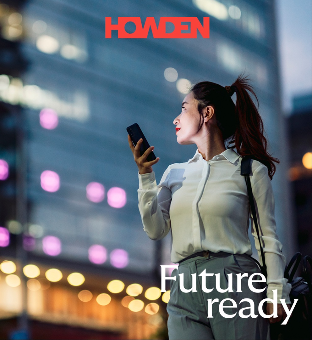 A woman in business attire holds a phone outdoors in a city, with "HOWDEN" and "Future ready" text on the image.
