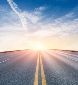 road leading into the sunset - road to recovery - Howden