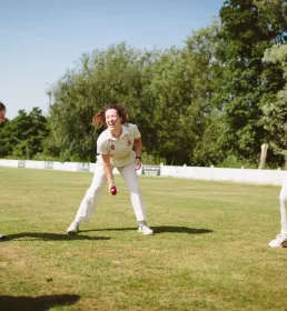 Women doing cricket catching practice drill