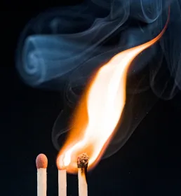 Three matches, with two alight and one unlit