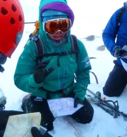 Mountaineering instructor with group