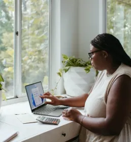 woman reviews work at home