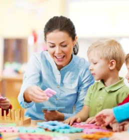 Nursery owner and children playing
