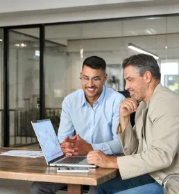 two men in casual wear having a meeting 