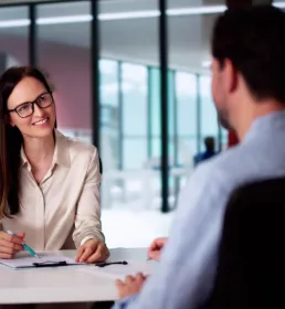 woman interviewing man 