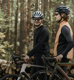 People riding on bikes, lauging