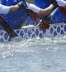 Oars going through water