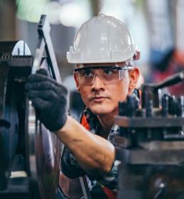 steel worker with machinery
