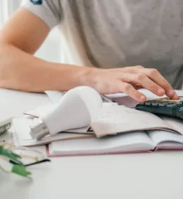someone using a calculator