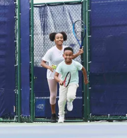 Kids running towards court