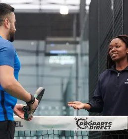 Padel referee speaking to player