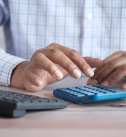 person using a calculator