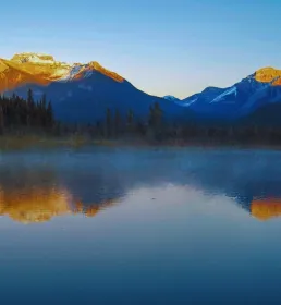 Reflection of summer mountains in a lake