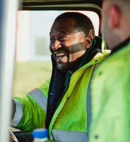 Waste disposal men in a van