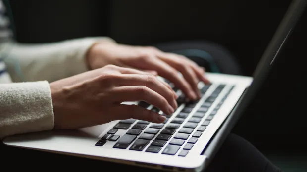 Employee typing on keyboard 