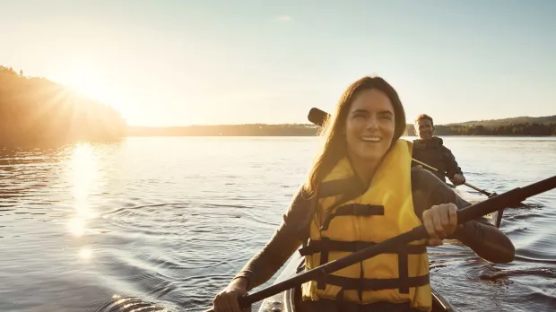 female rowing canoe