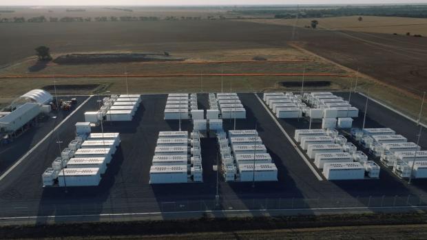 Aerial view of a Battery Energy Storage System (BESS) Facility in a rural landscape. Designed to support renewable integration, load balancing, and grid electricity.