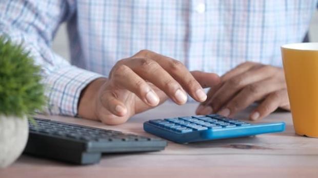 person using a calculator