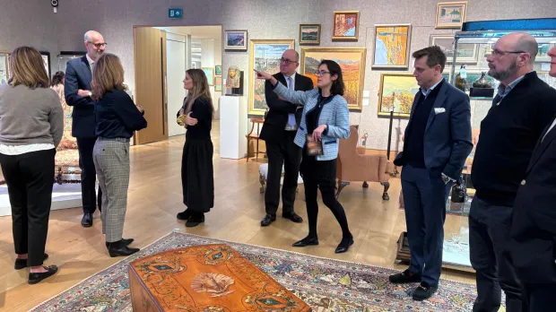 Team gathered at Bonhams to view latest collection