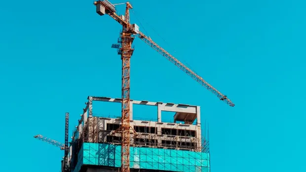 crane atop a skyscraper