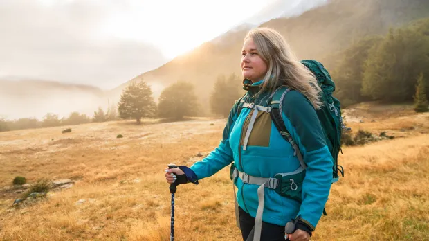 Woman conquering a long hike