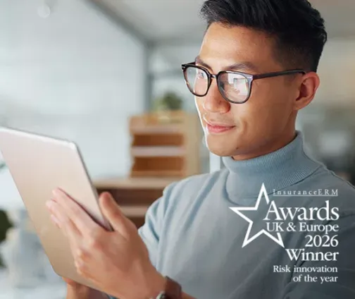 man looking at tablet computer