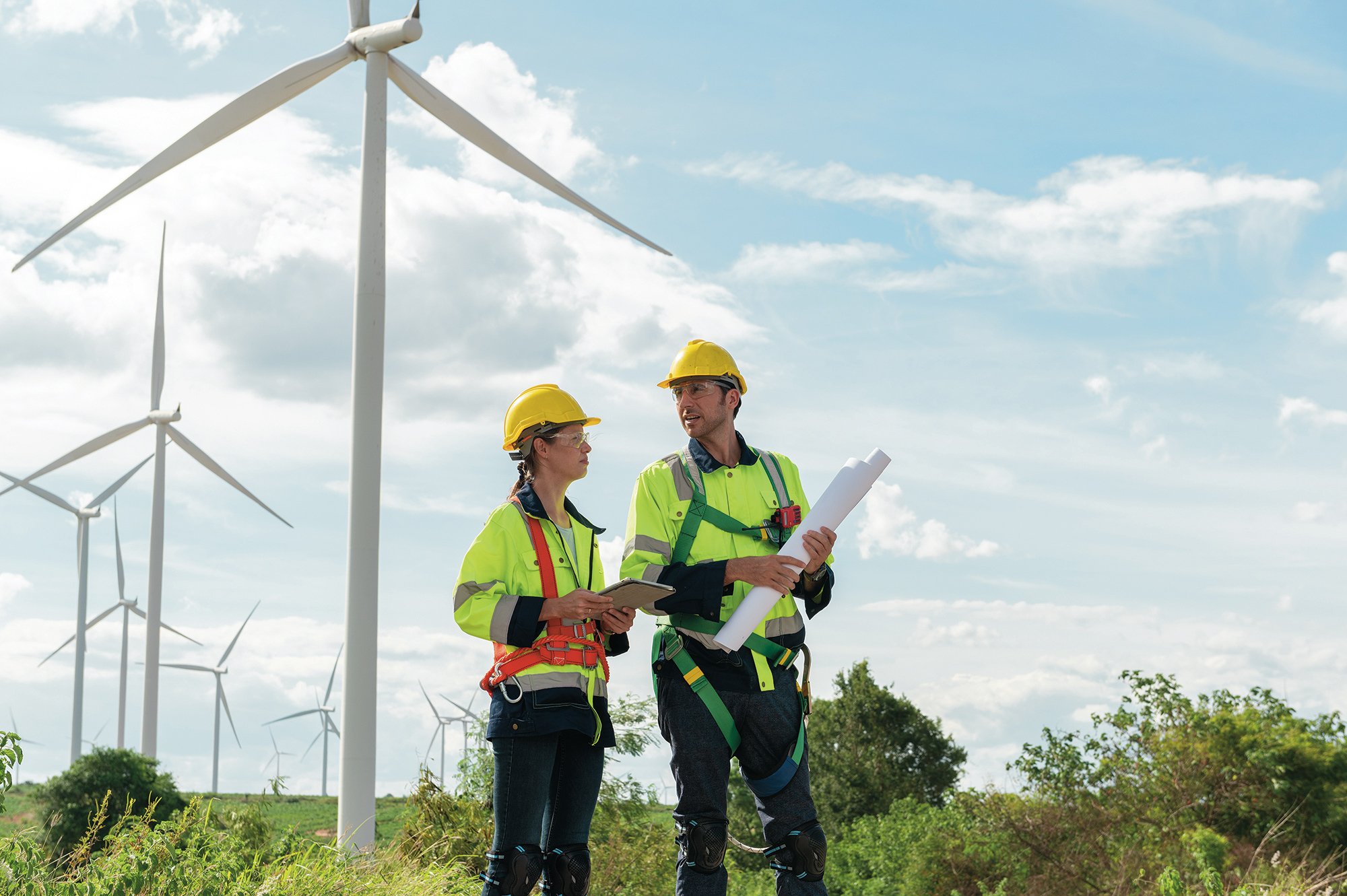 Two engineers at a windmill 