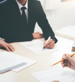 Solicitors signing contracts