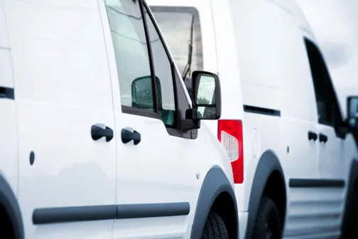 Two commercial vans lined up one behind the other