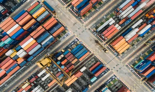 Cargo containers at a dockyard