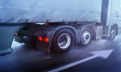 Wheels of a Truck on rainy road
