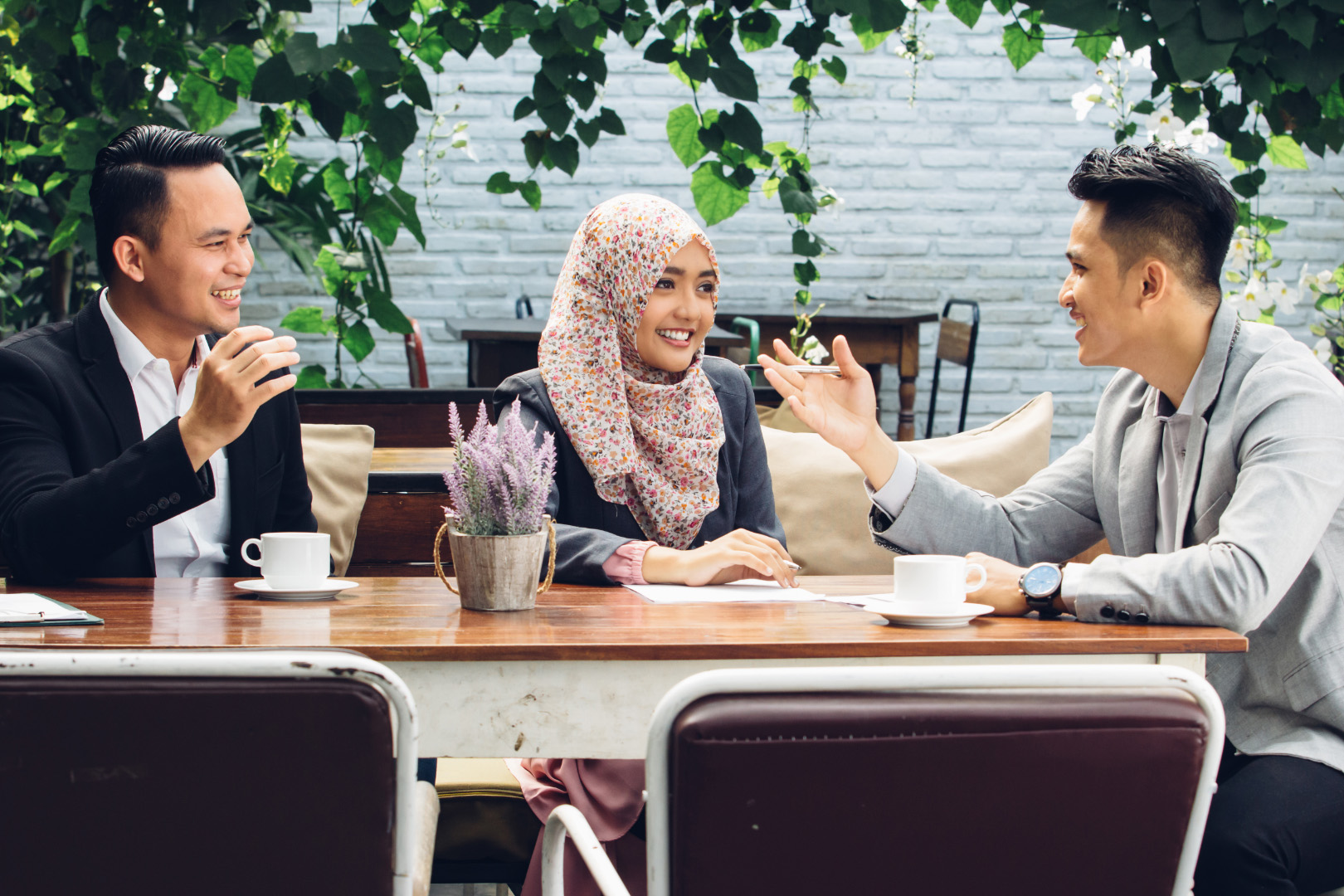 Business People Teamwork Meeting at Cafe