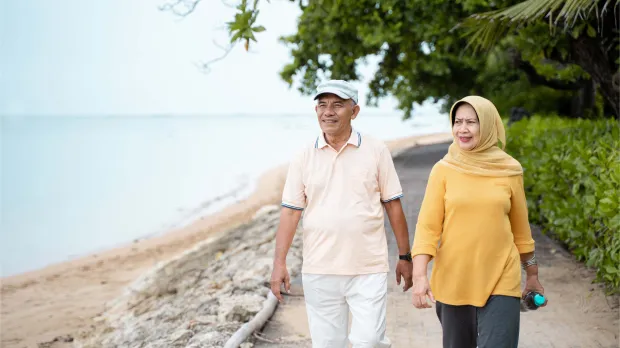 Senior Asian Couple Walking and Exercising Senior Asian Couple Walking and Exercising