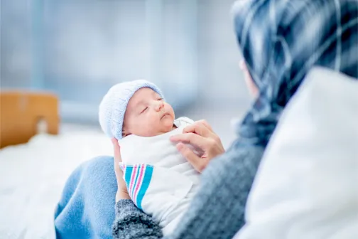 Muslim mother and baby
