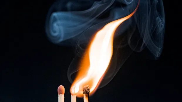 Three matches, with two alight and one unlit