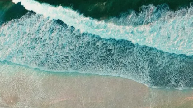 Waves breaking on a beach