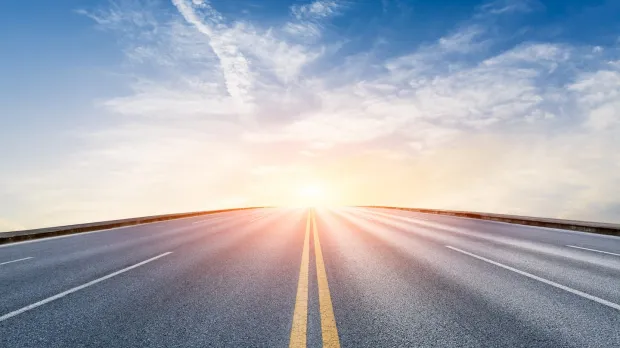 road leading into the sunset - road to recovery - Howden