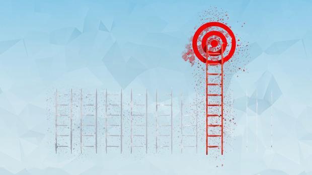 White ladders lined up in a row, with one red ladder topped by a red target