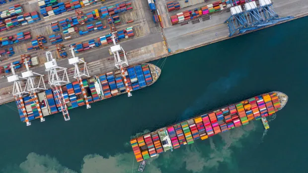 Overhead shot of cargo ship in dock