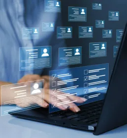 rendered stat images above laptop