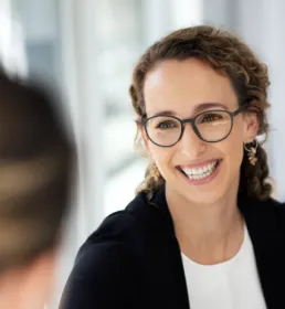 Person smiling at another person
