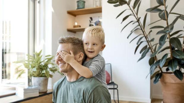 A father and son playing
