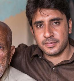 Omani middle aged father and grown up son