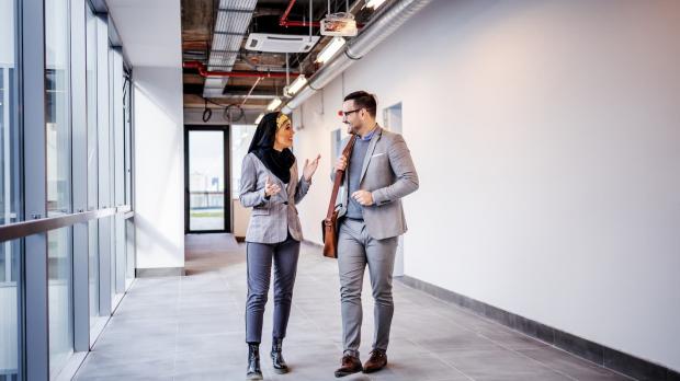 Female advisor talking to male client