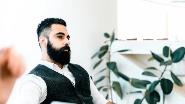 Man with beard looking a little stressed
