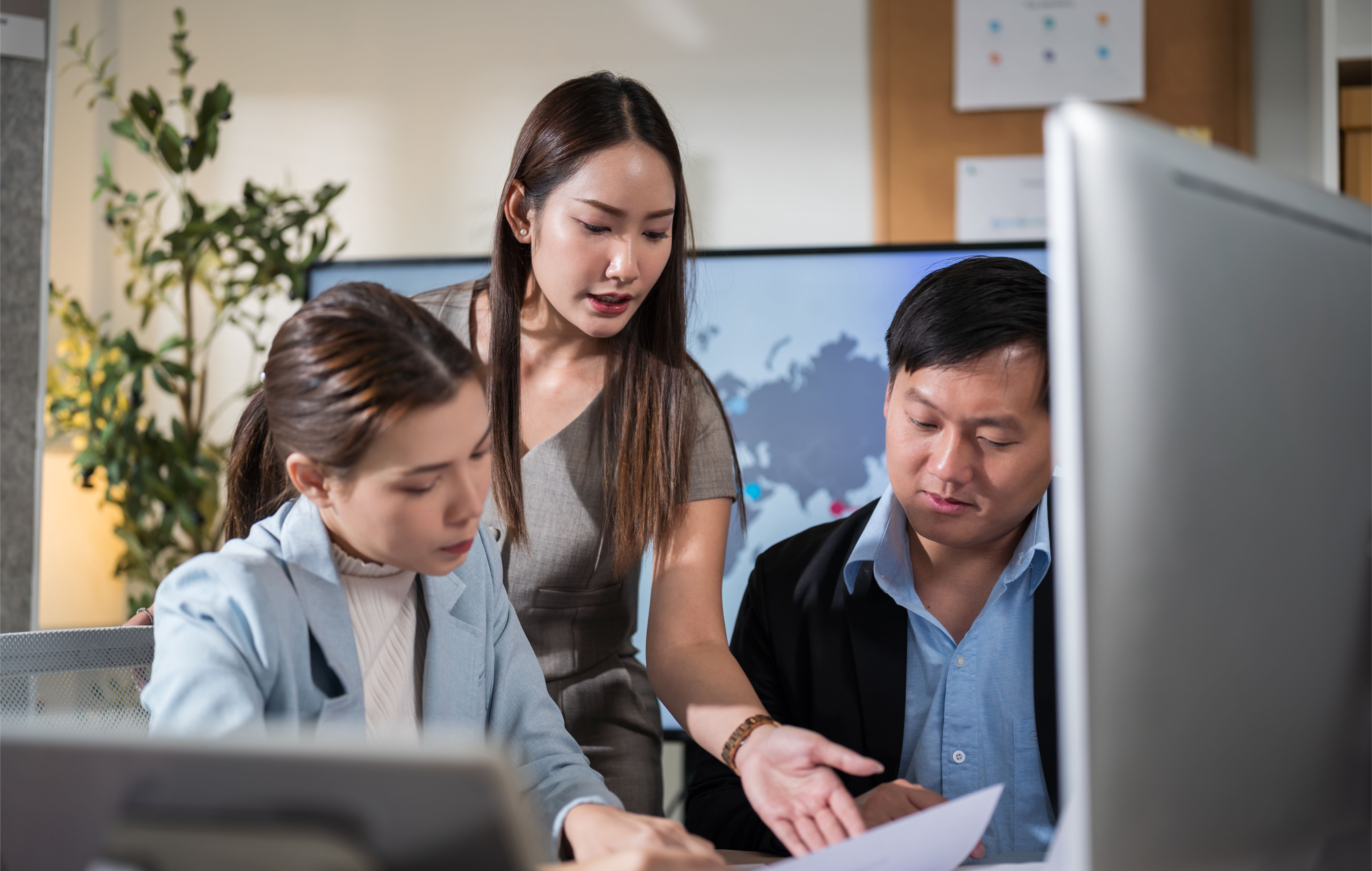 Colleagues' teamwork of engineer and business team having a meeting on the board in the office