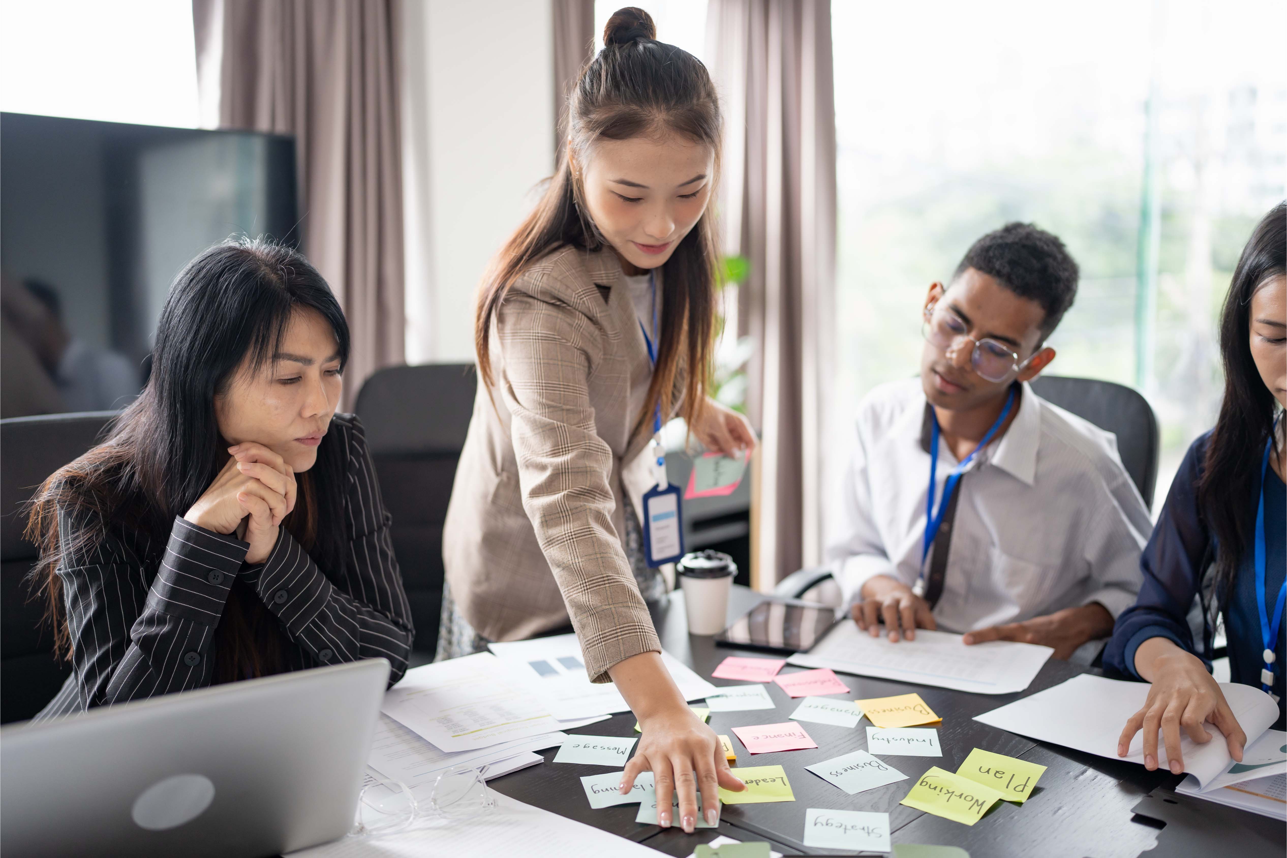 Multiracial Asian colleagues in the office