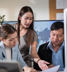 Colleagues' teamwork of engineer and business team having a meeting on the board in the office