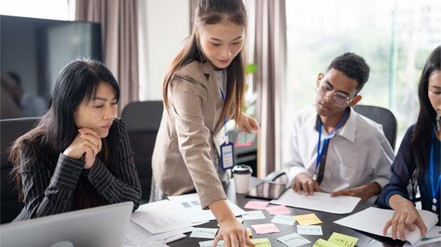 Multiracial Asian colleagues in the office