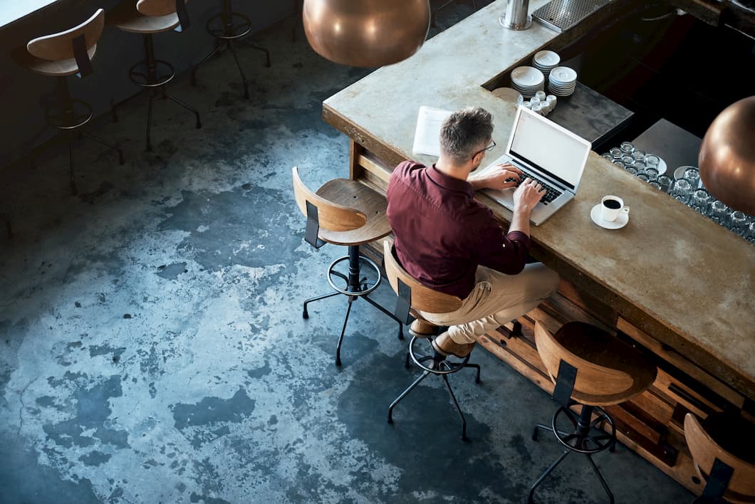 man working in coffee shop 